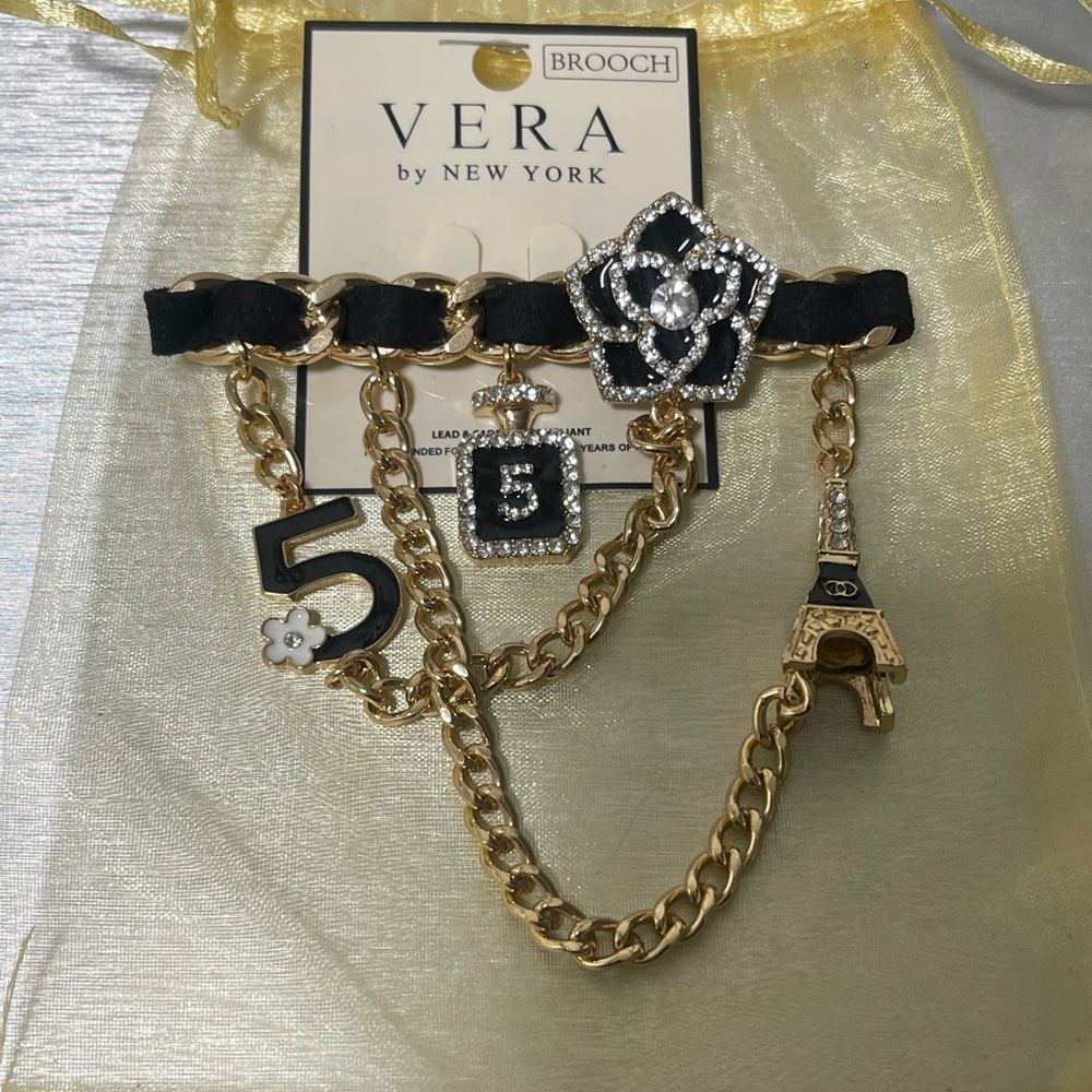 Stunning Black and Gold Charm Brooch.